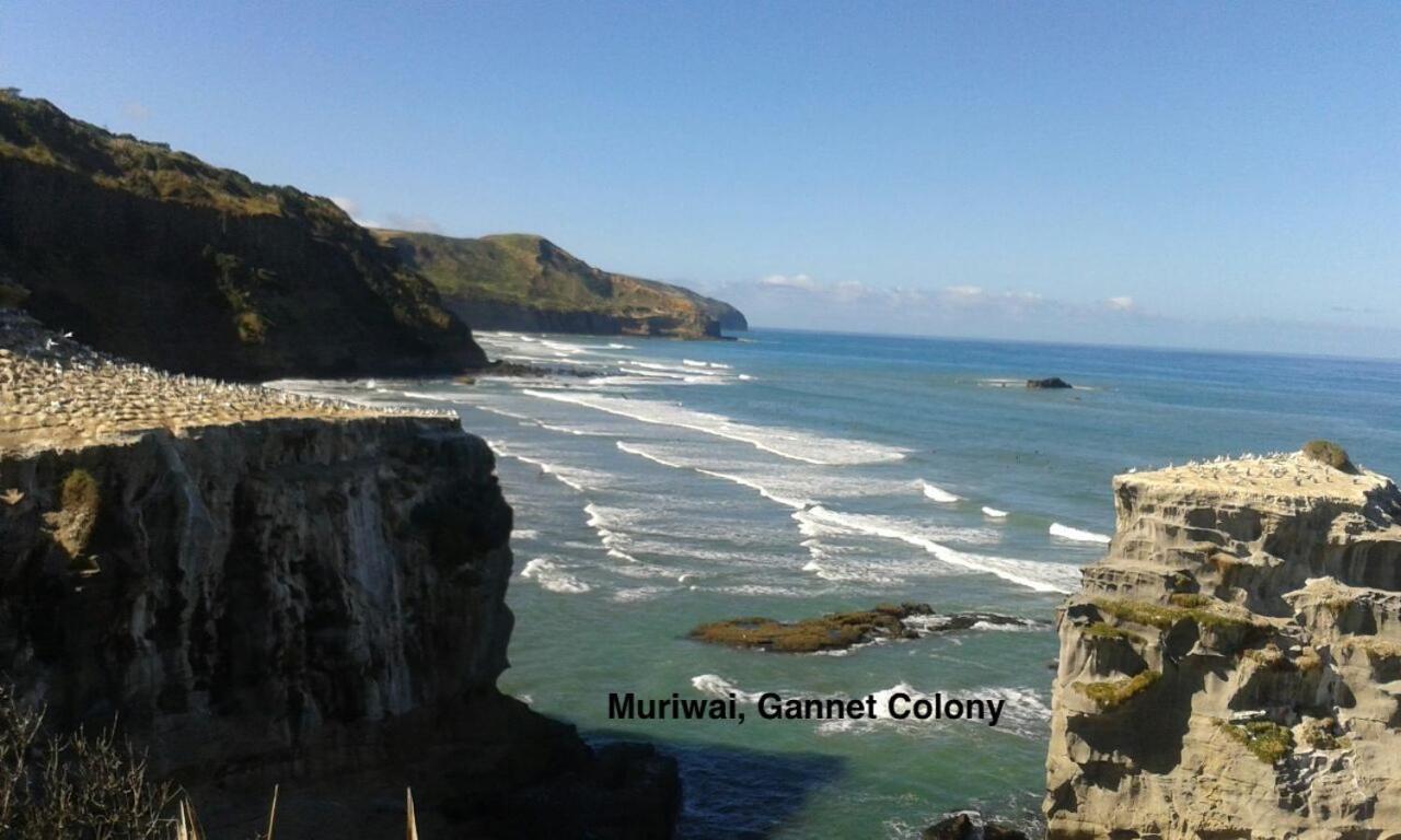 Вилла Te Henga Hideaway Bethells Beach Экстерьер фото