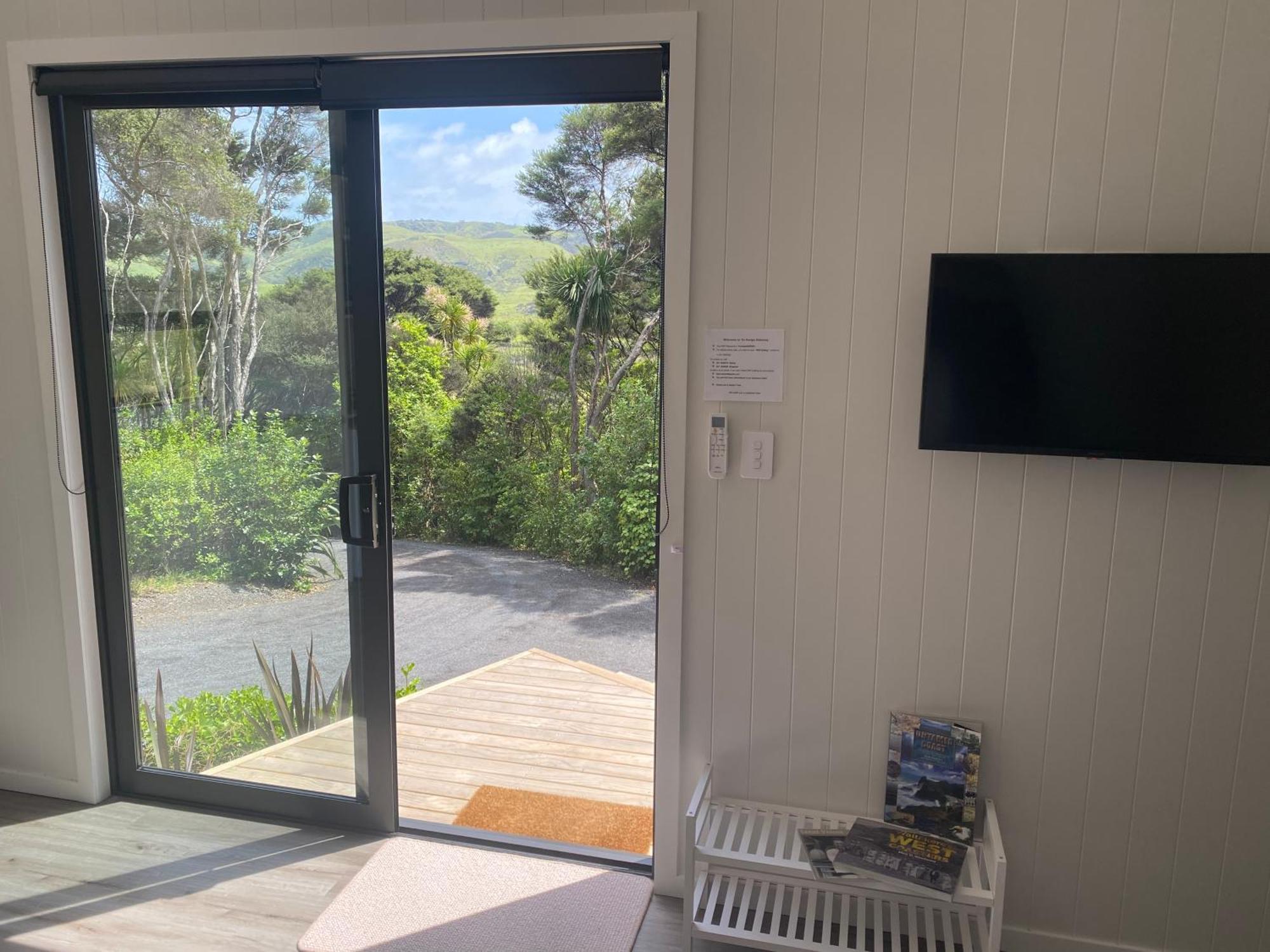 Вилла Te Henga Hideaway Bethells Beach Экстерьер фото
